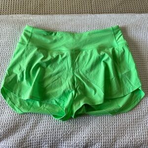 Lululemon women’s size 8 speed up shorts, mid rise, 4” inseam. Pistachio color.